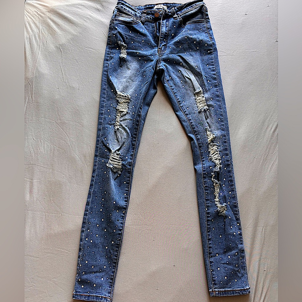 Bedazzled ripped skinny jeans